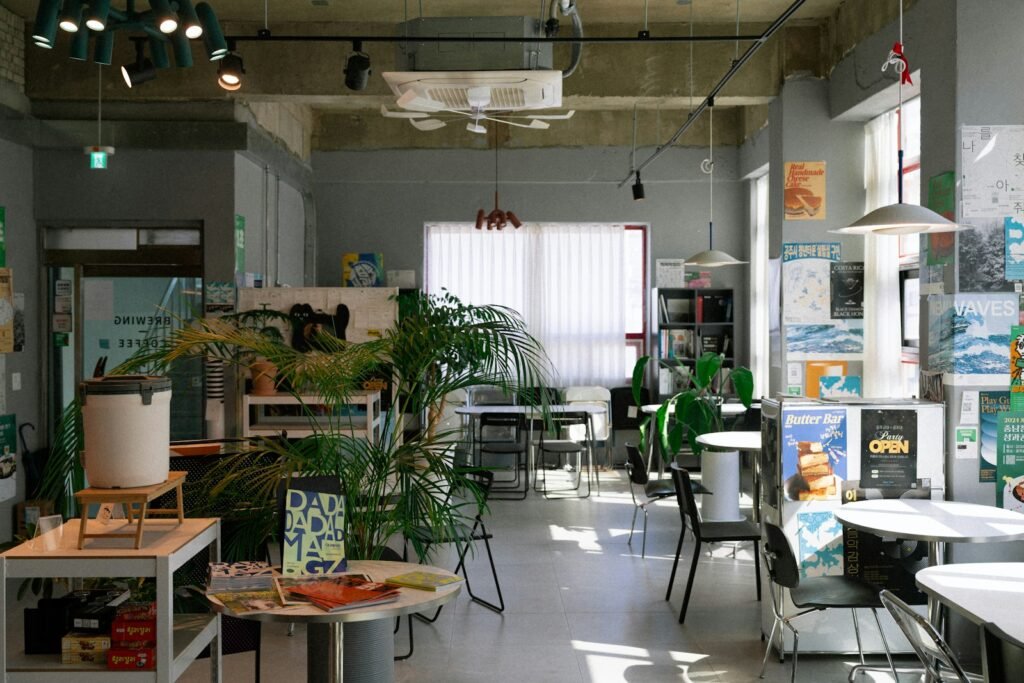 Light-filled cafe interior with plants